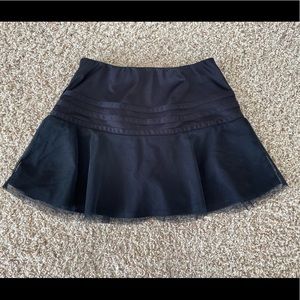 Adidas girls black tennis skirt, size M (10/12), in like new condition.
